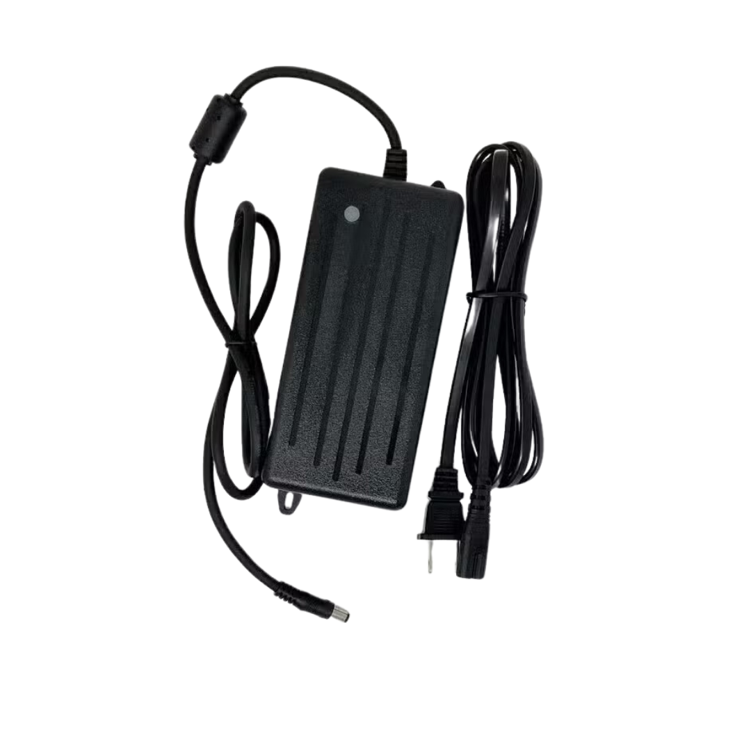 The Glion SNAPnGO Scooter Accessories include a black power adapter with a two-prong plug, a circular connector for the lithium-ion battery, and a small indicator light.